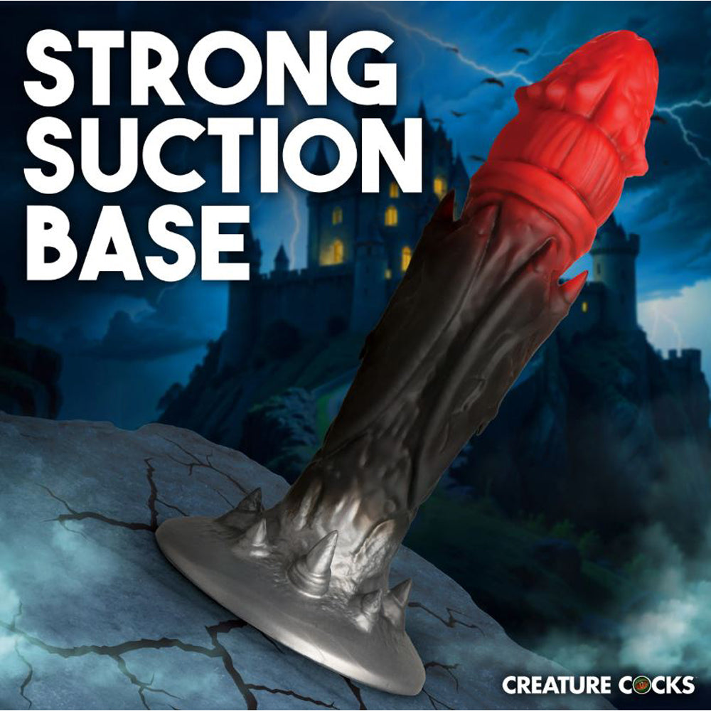 Fantasy silicone dildo with a spiked suction cup base.