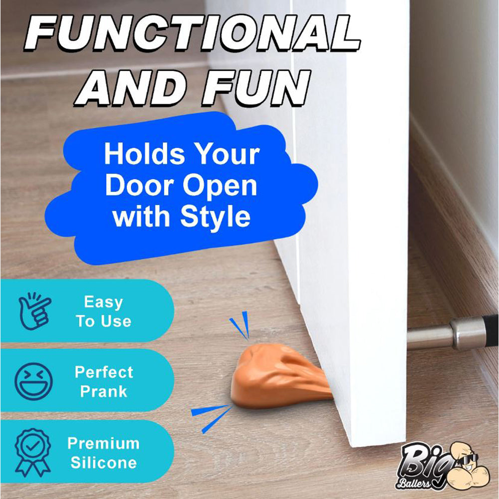 Orange silicone door stop shaped like a pair of testicles, holding a door open.