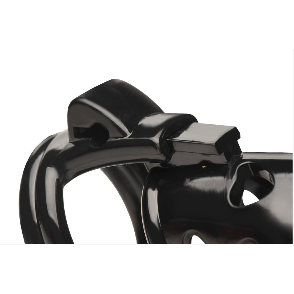 Black plastic double ring chastity cage with a hard stop mechanism.