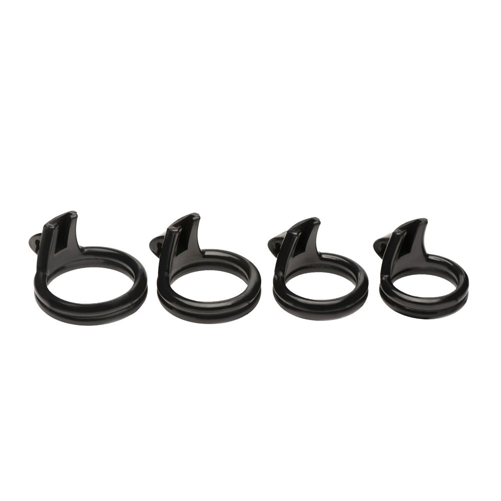 Four black plastic rings of varying sizes.