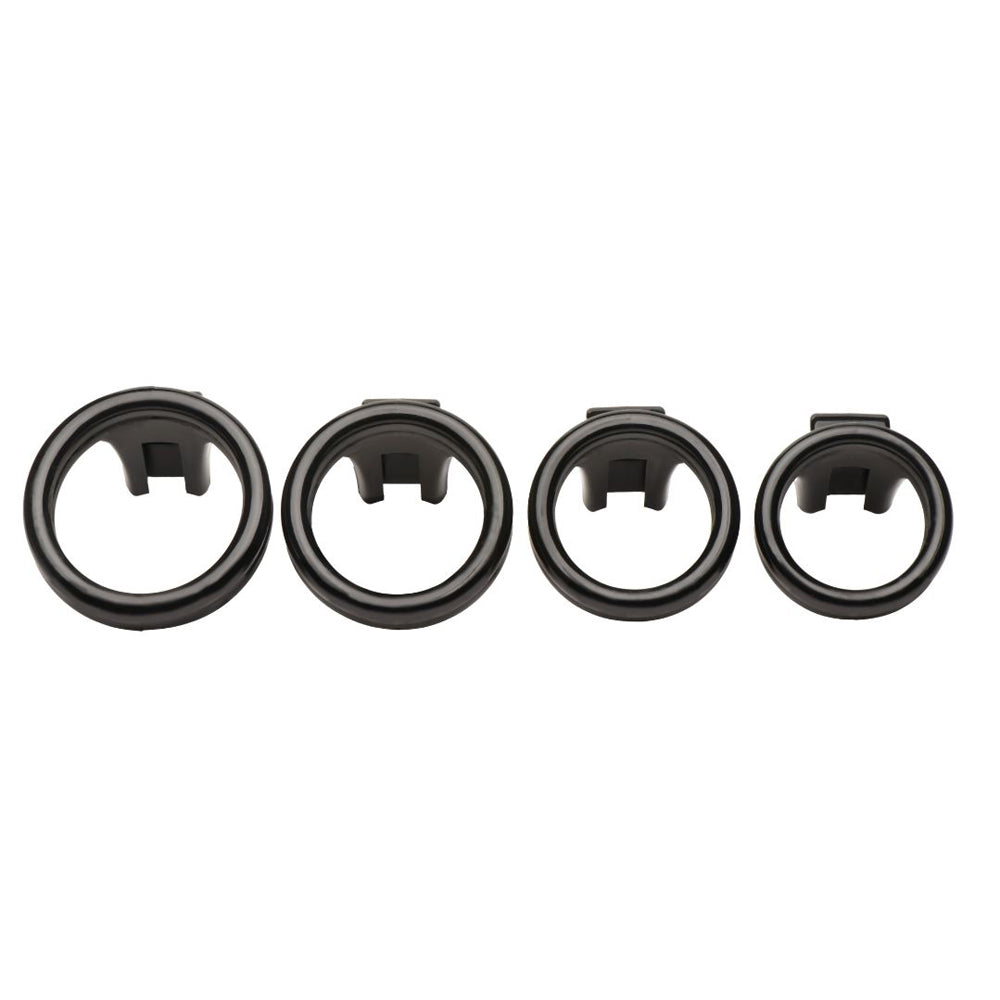 Four black plastic rings of varying sizes.