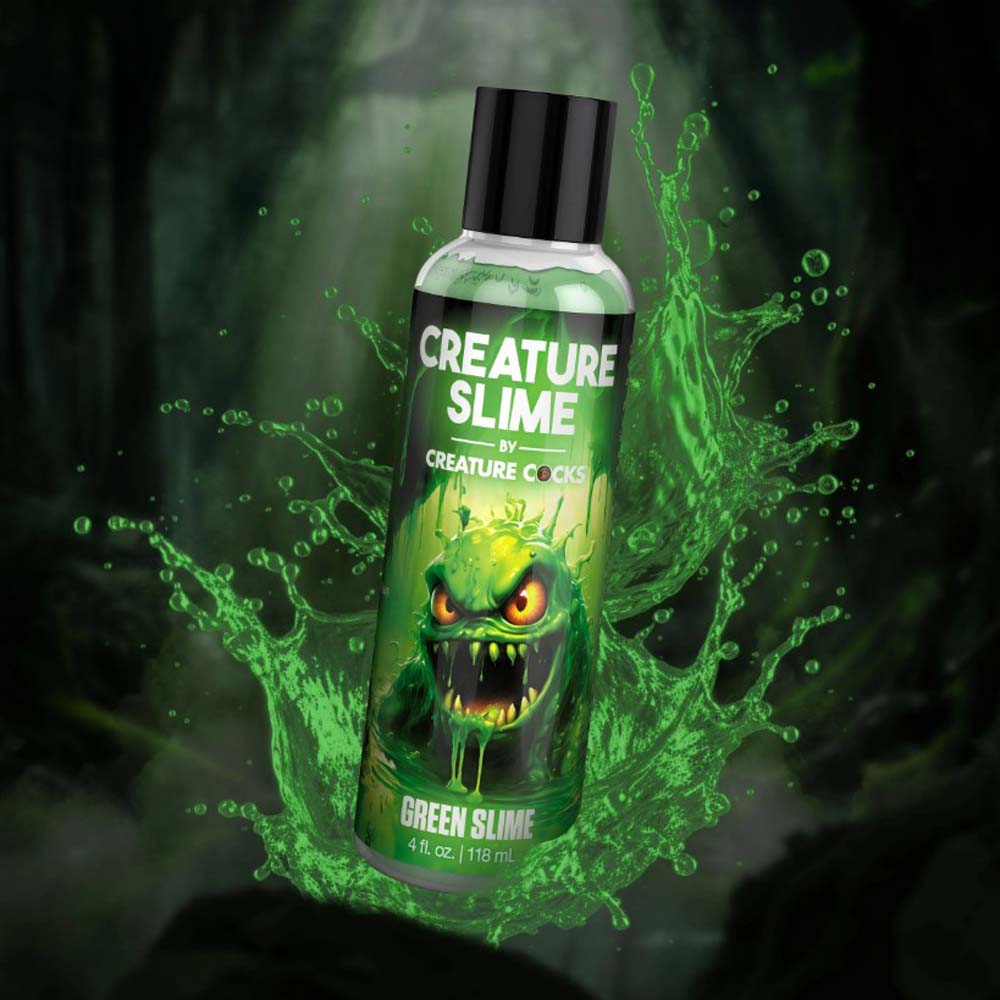 A bottle of Green Slime personal lubricant with a monster graphic.