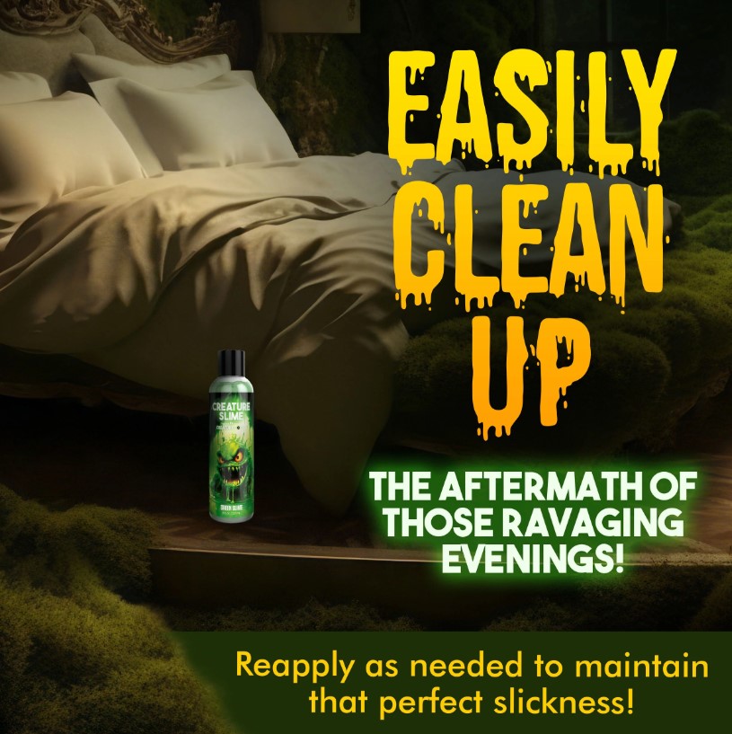 A bottle of green slime-themed personal lubricant sits on a bed.