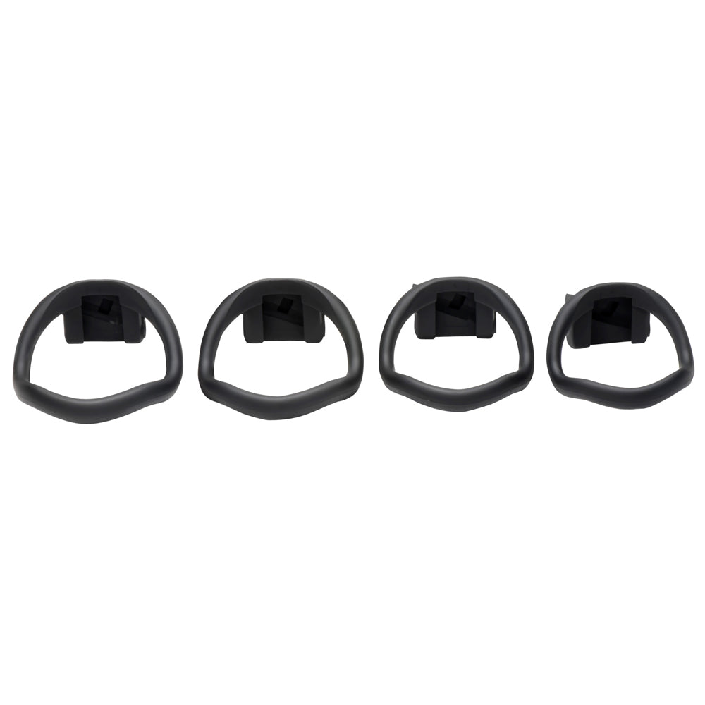 Four black plastic chastity cage rings of varying sizes.