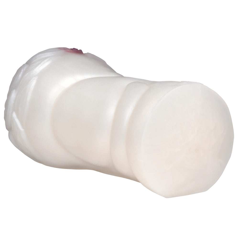 White silicone stroker with textured interior and detachable fur.