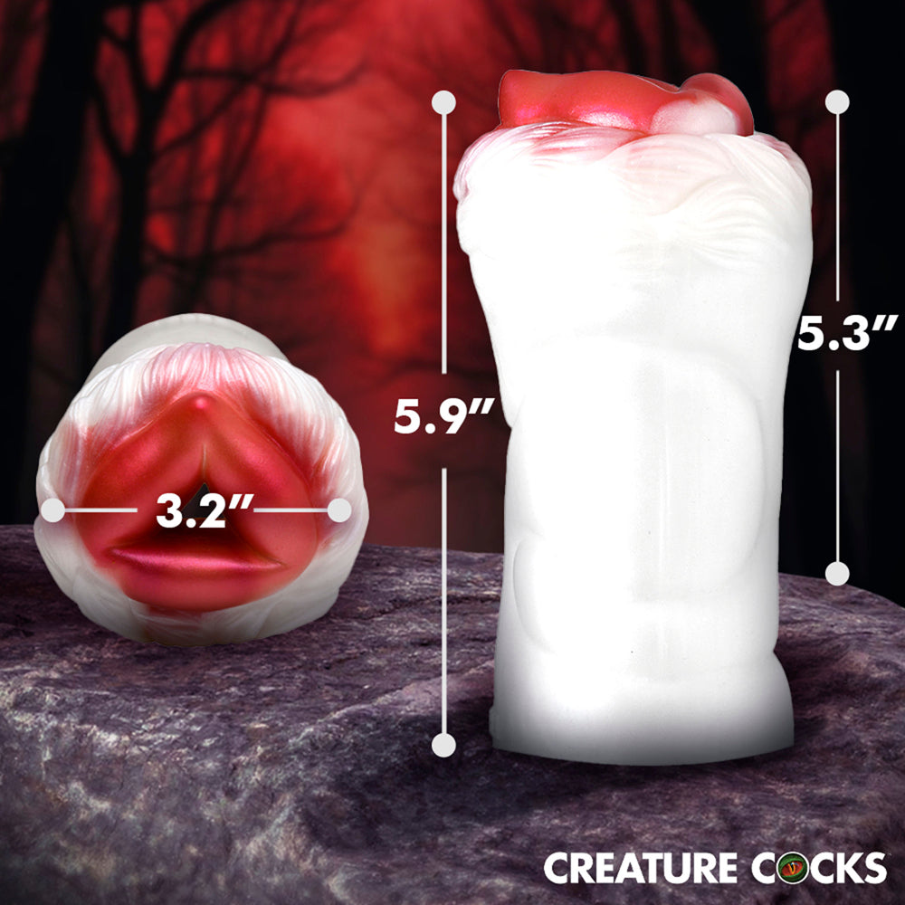 Snow She-Wolf silicone stroker with red interior and white fur trim.