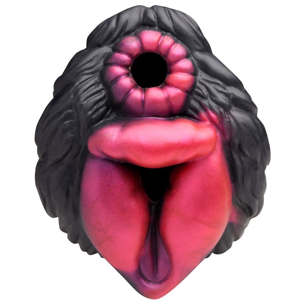 A black and pink she-wolf silicone stroker with washable fur.