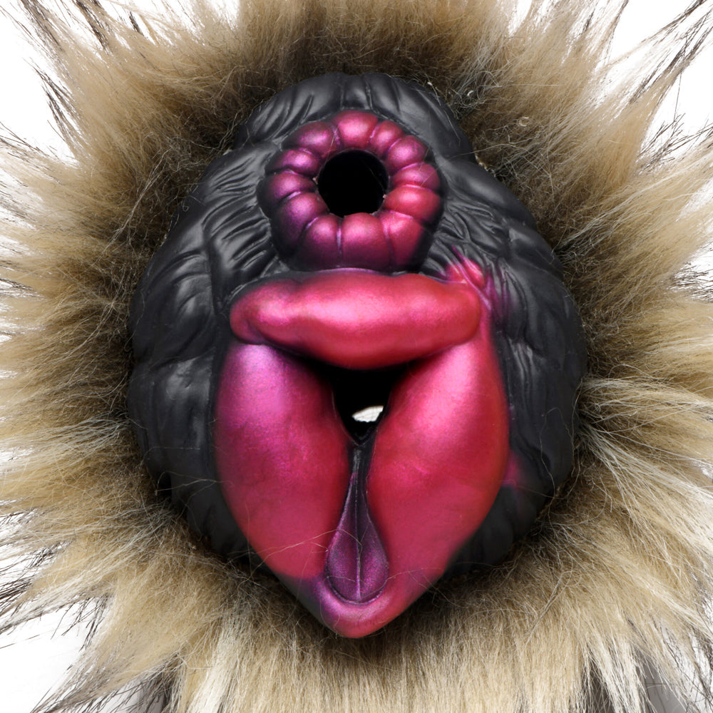 A realistic wolf mask with pink and purple accents and fluffy brown fur.