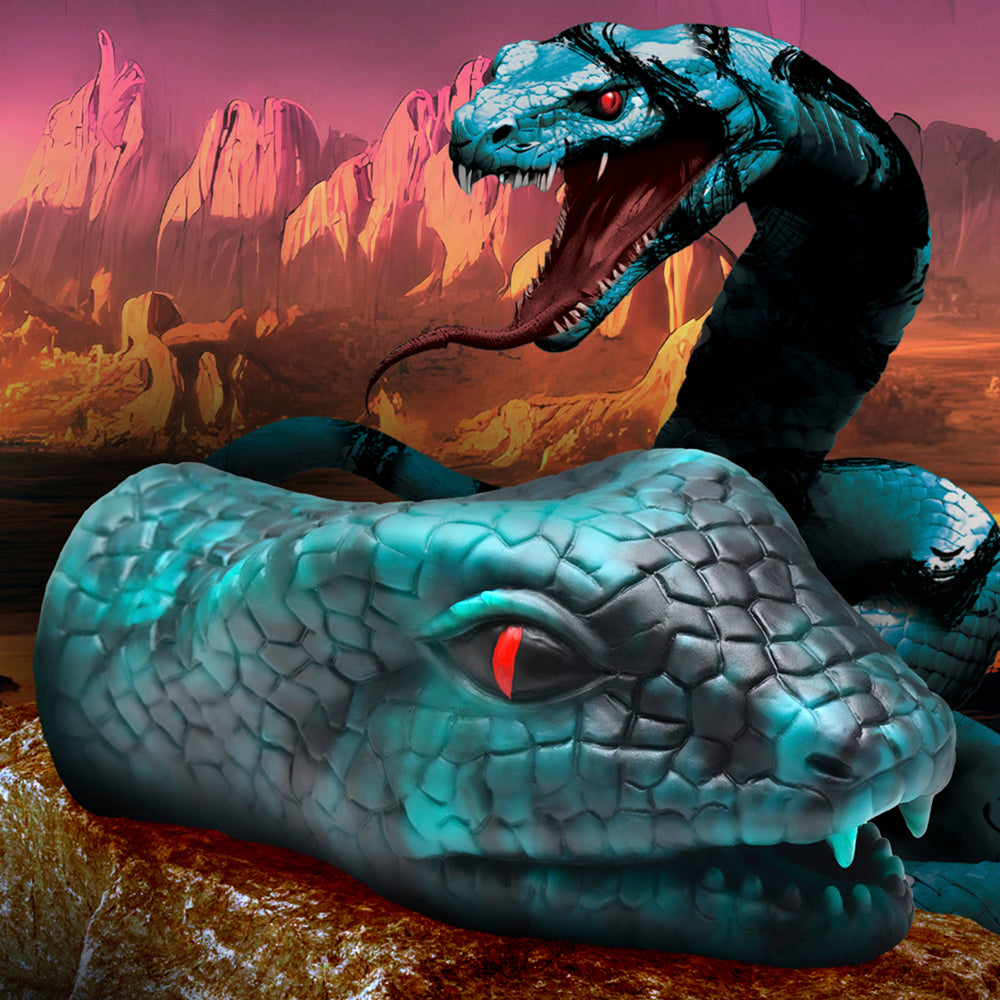 A blue and green textured snake stroker with red eyes rests on a rock.