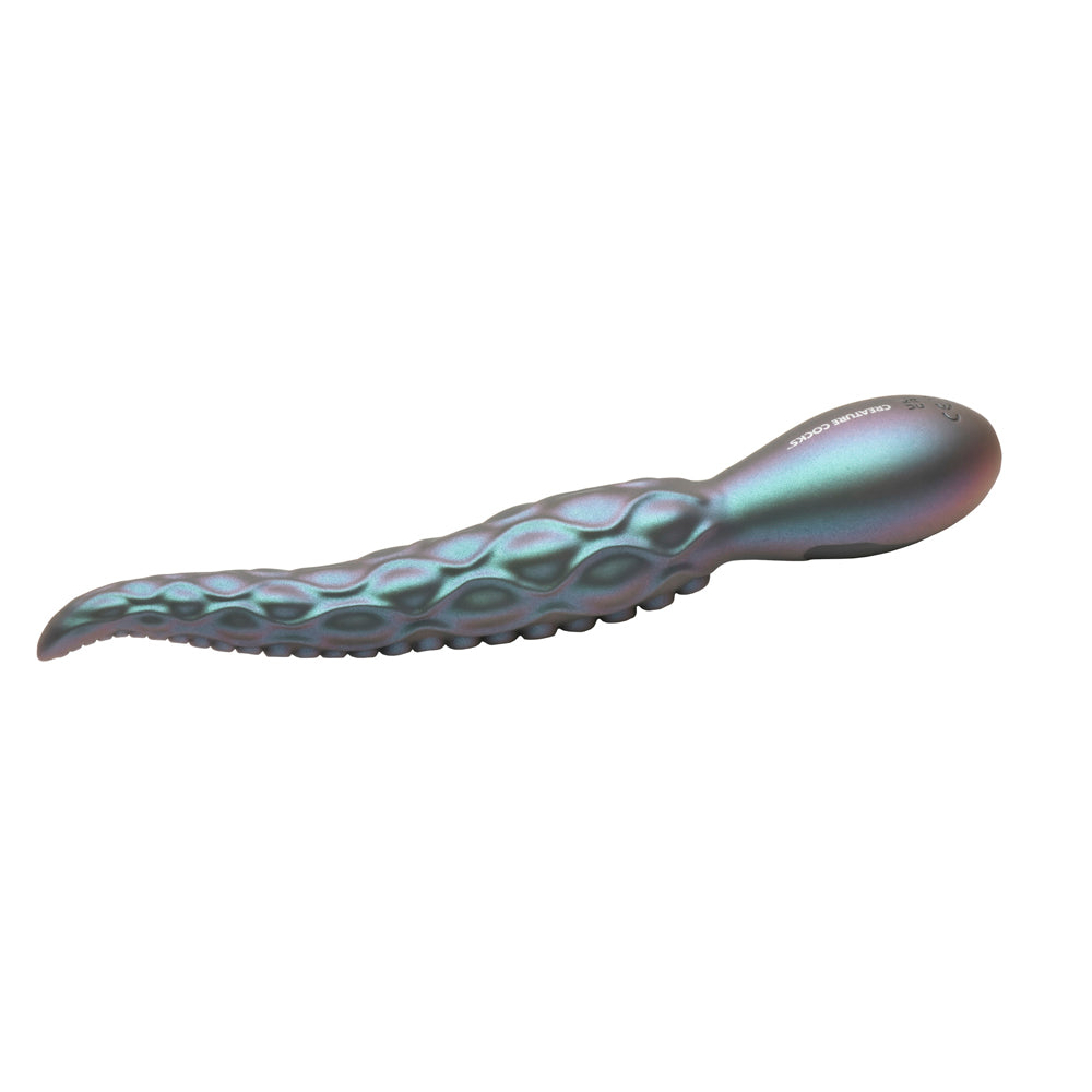 A teal iridescent silicone vibrator with tentacle-like texture and suckers.