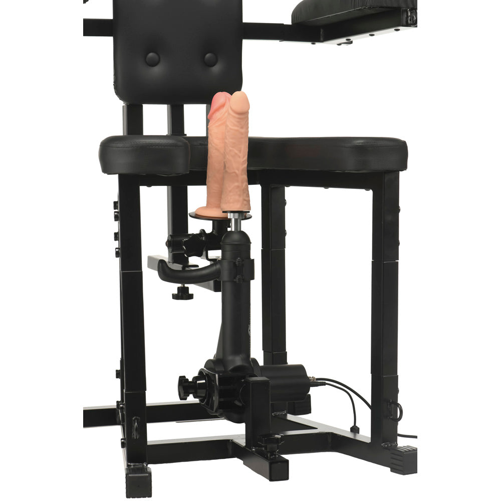 Bondage chair with a motorized sex machine and two dildos.