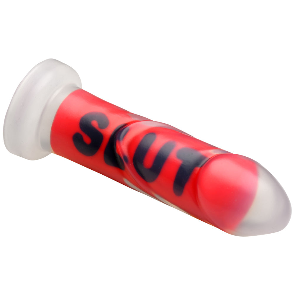 Red ribbed silicone dildo with black lettering and a clear suction cup base.