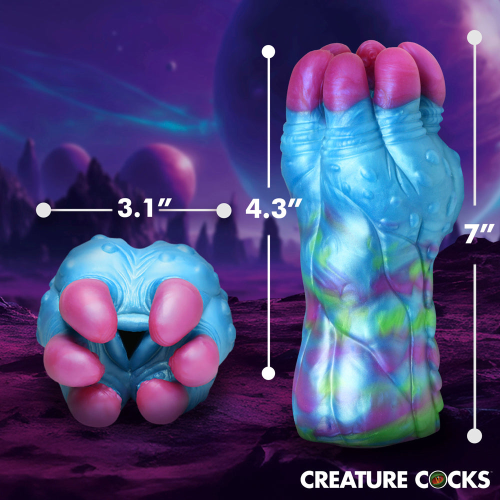 Blue and pink alien-shaped silicone stroker with textured interior.