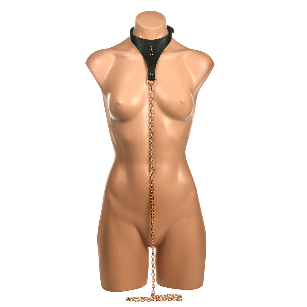 Vegan leather bondage collar with detachable body chain on mannequin.