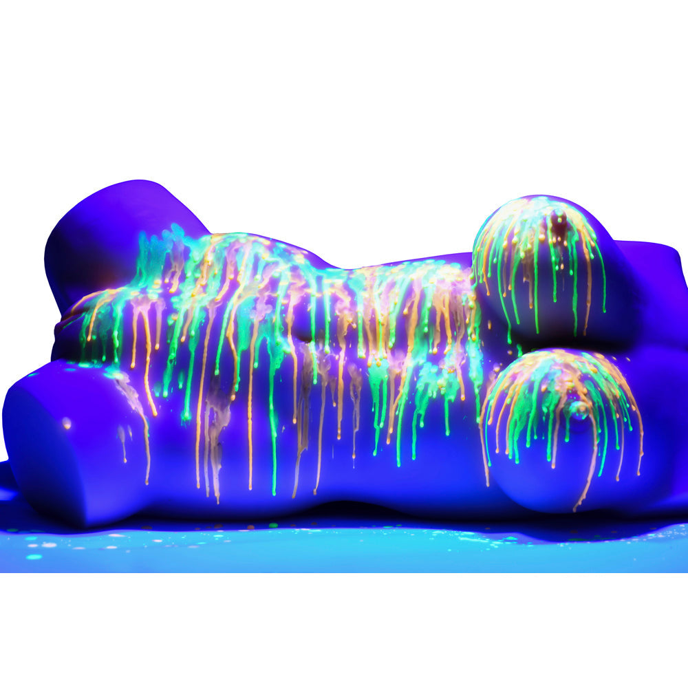 UV blacklight reactive candles with neon drips on a purple form.