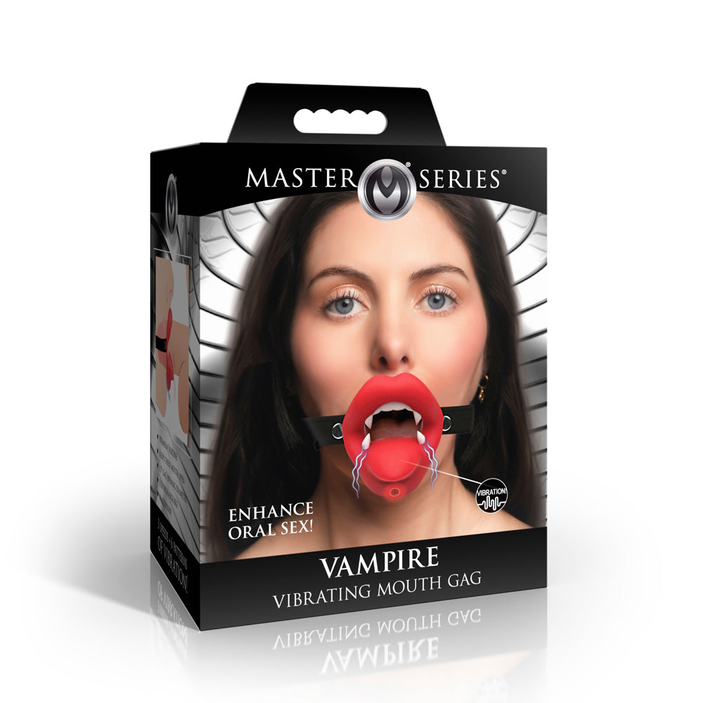 A vibrating vampire mouth gag with red lips and fangs on a black box.