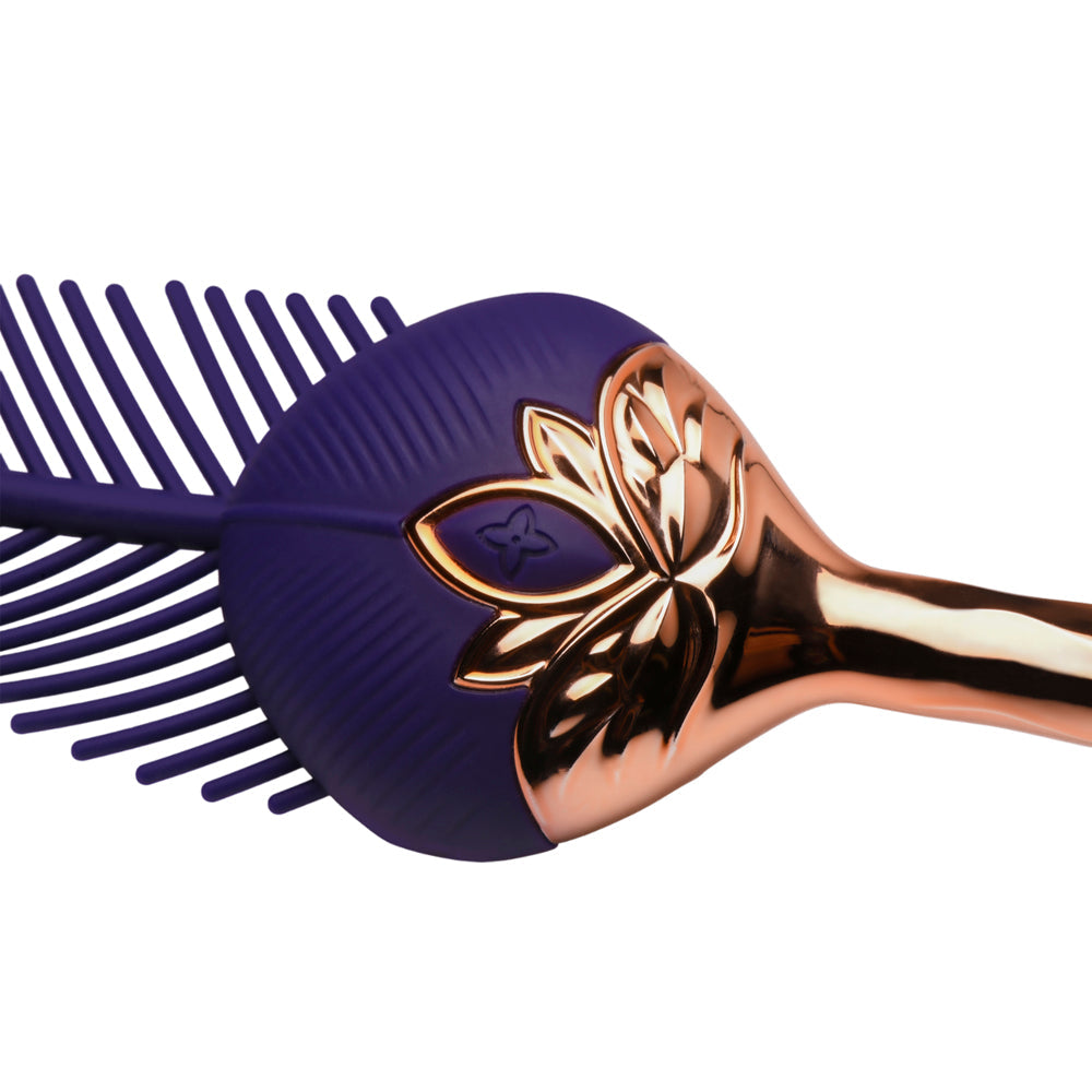 Purple silicone feather tickler with rose gold accents.