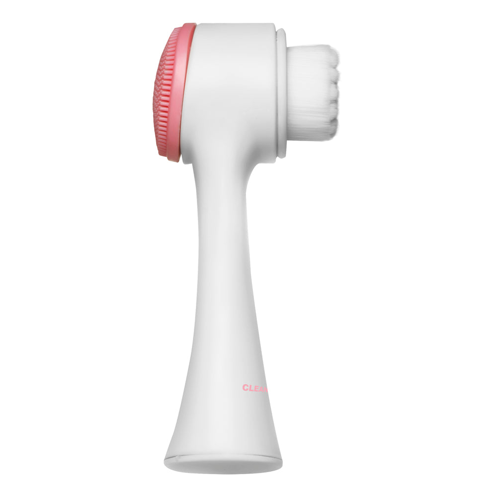A white facial cleansing brush with a pink rim and white bristles.