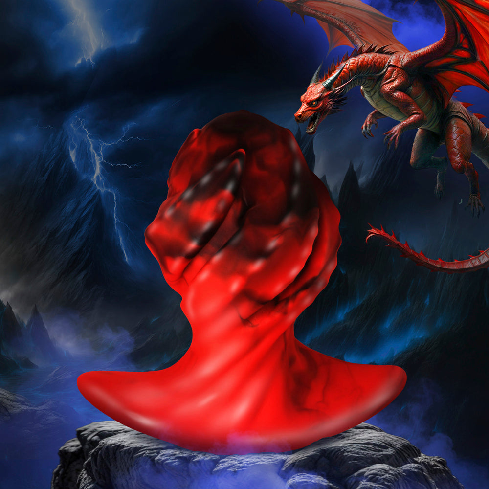 Red and black dragon egg shaped silicone butt plug with twisted ridges.