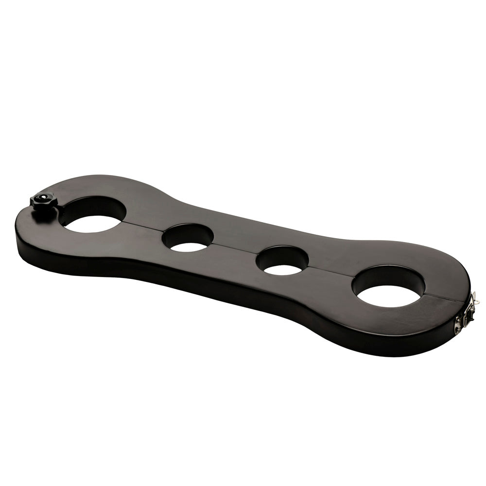Black wood restraint device with three circular openings and metal clasps.