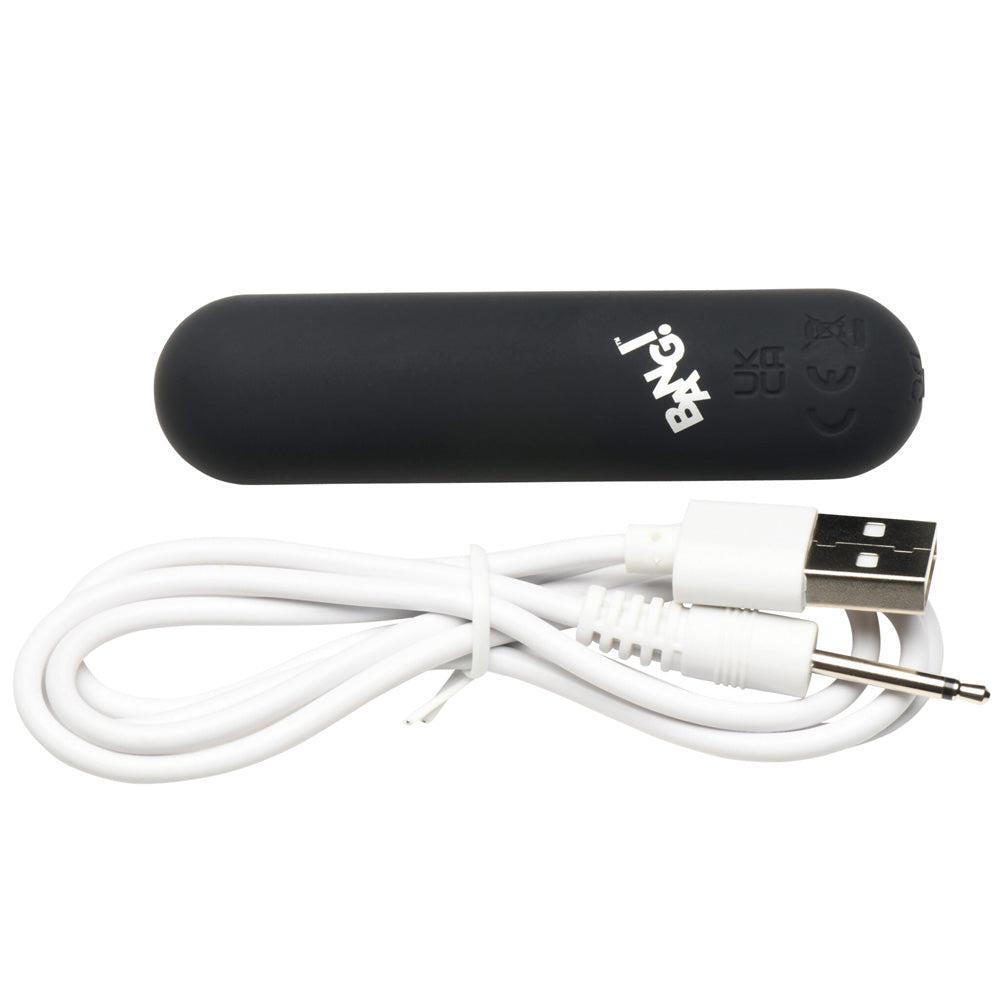 Black flexible silicone bullet vibrator with USB charging cable.