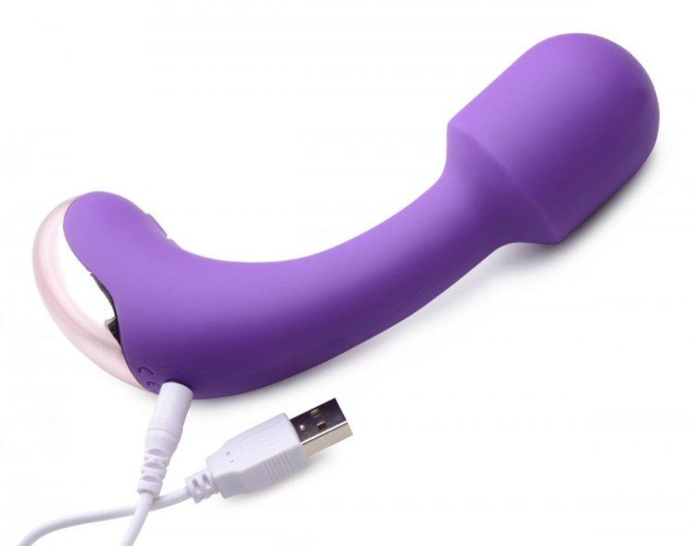 Purple curved silicone massager with a USB charging cable.