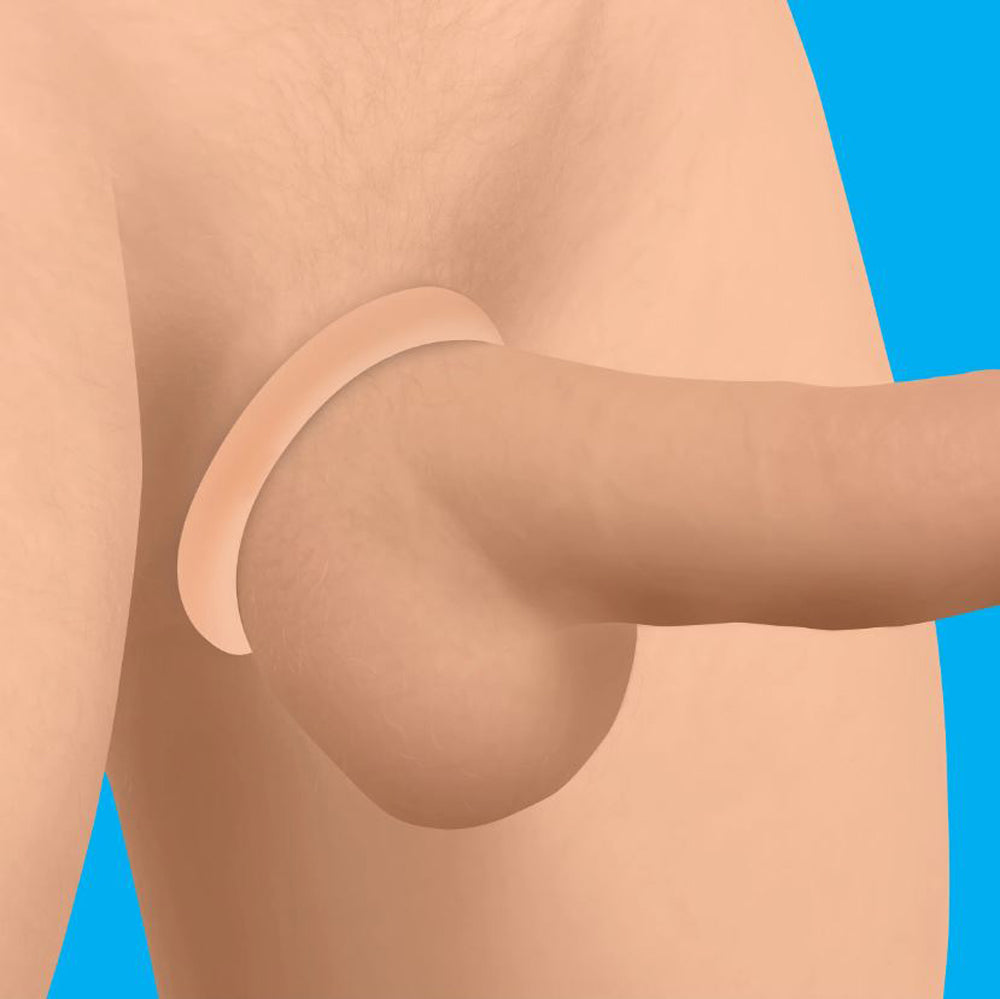 Light-colored silicone cock ring stretched around a penis on blue background.