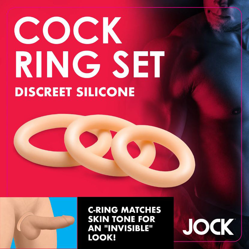 Three light-colored silicone cock rings of graduated sizes.