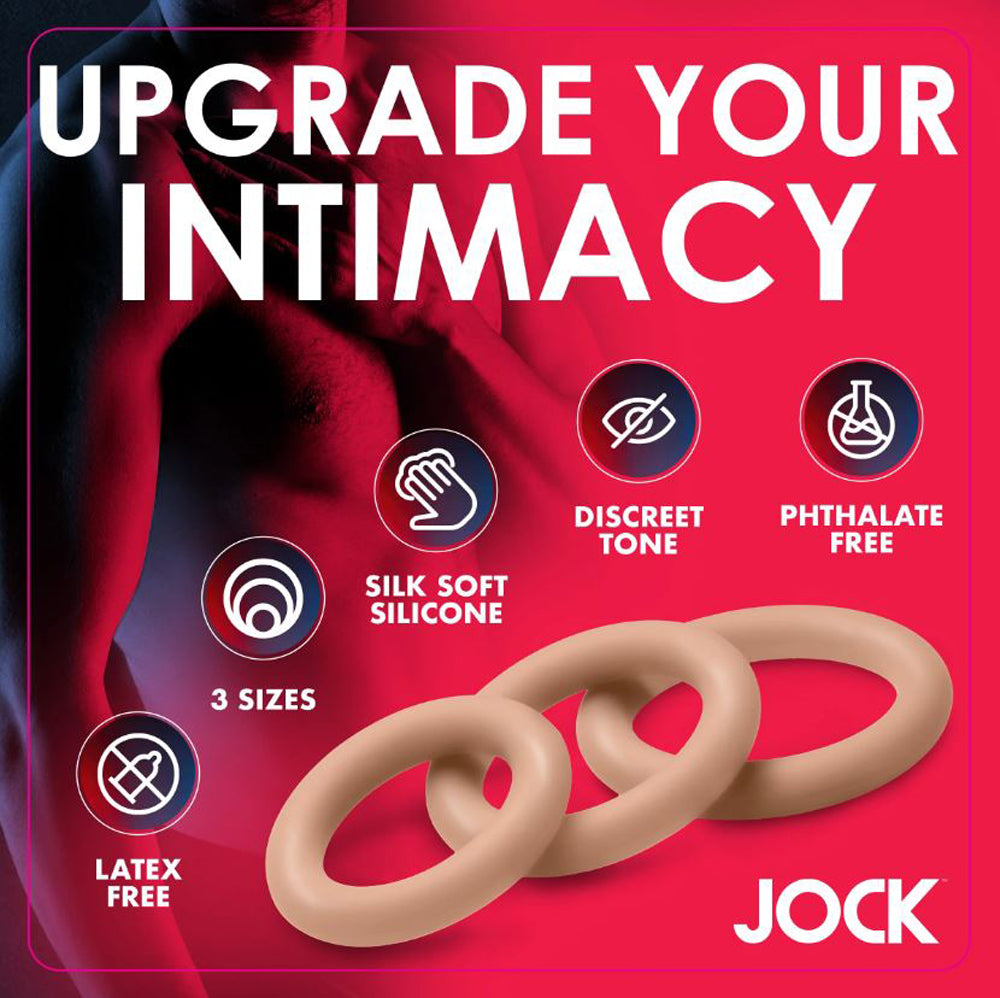 Three tan silicone cock rings with icons for discreet tone, phthalate free, silk soft silicone, 3 sizes, and latex free.