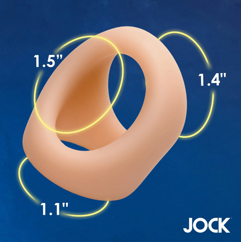 Silicone cock and ball ring in light skin tone with size indicators.