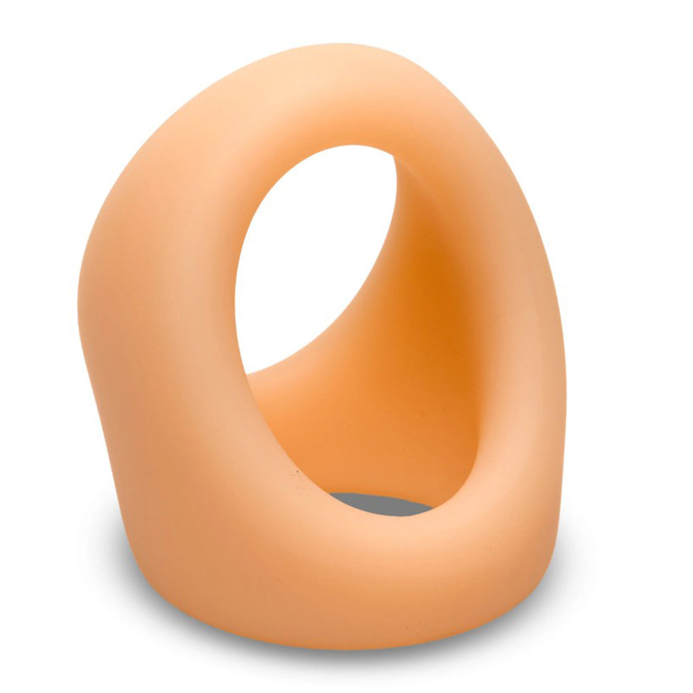 Light skin tone silicone cock and ball ring.
