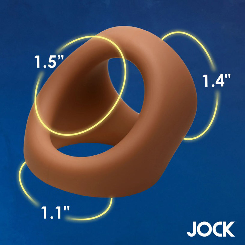 Tan silicone cock and ball ring with inner diameters of 1.1, 1.4, and 1.5 inches.
