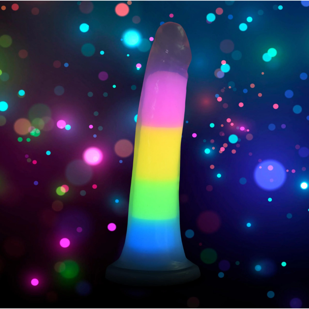 A rainbow-colored silicone dildo with a glowing effect.