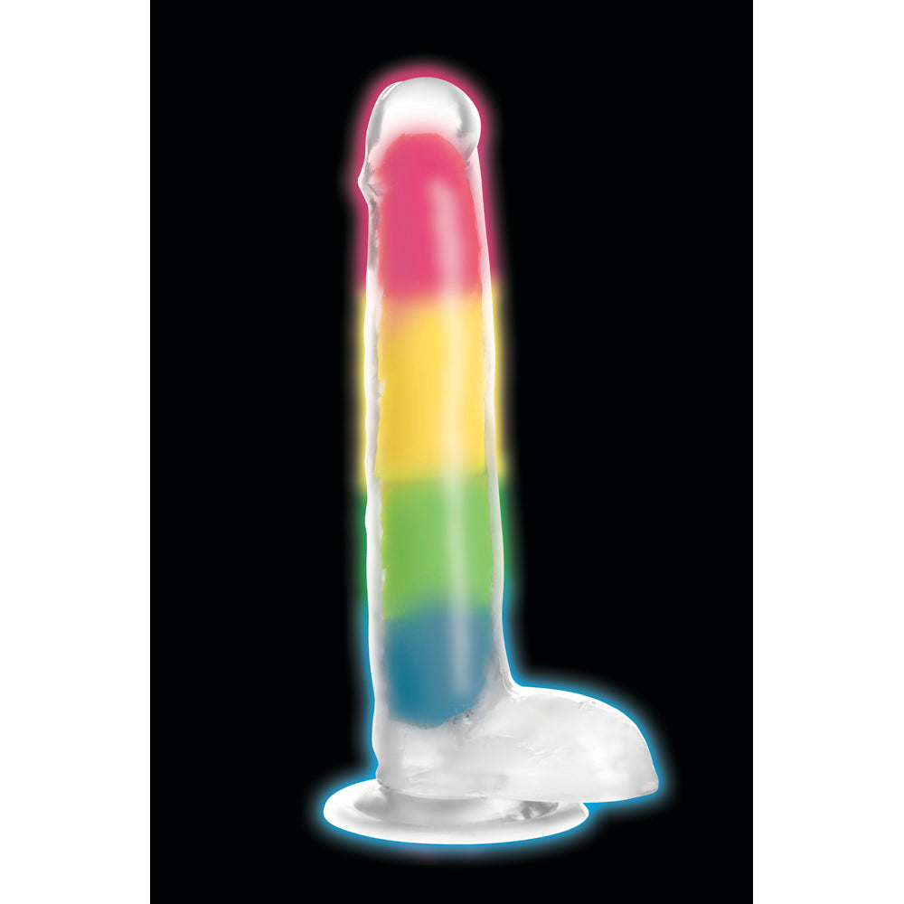 A glow-in-the-dark rainbow silicone dildo with balls.