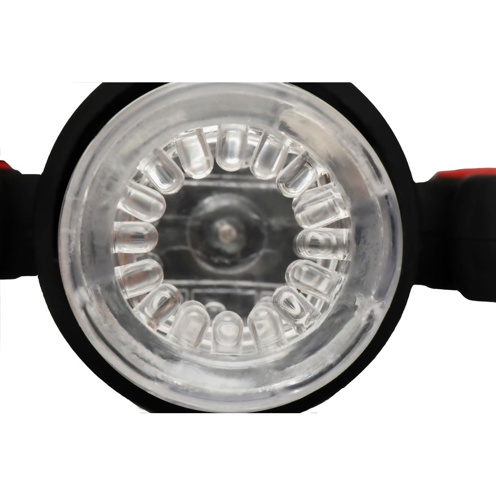 Close-up of a clear textured masturbator with black casing.