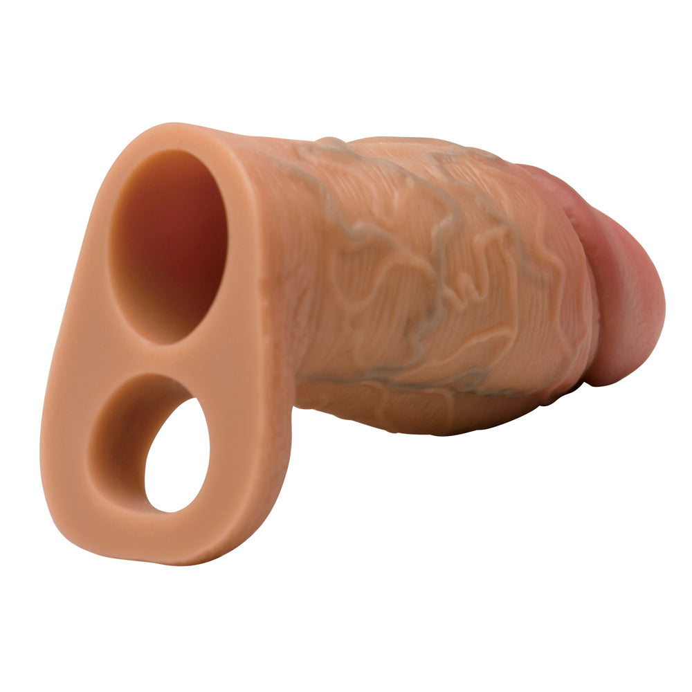 Tan silicone penis extension sleeve with a dual loop strap.