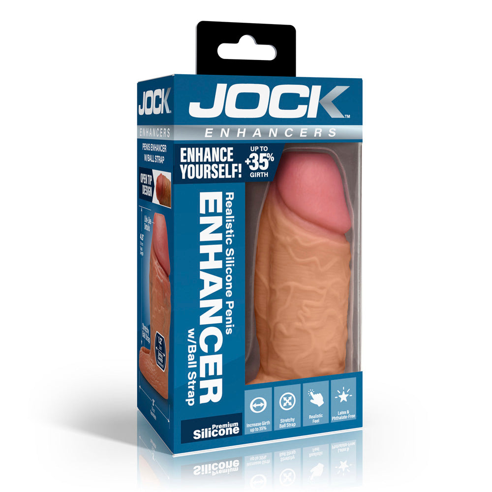 Tan silicone penis extension sleeve with ball strap in blue packaging.