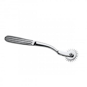 Stainless steel Wartenburg wheel with a ribbed handle and a rotating spiked wheel.