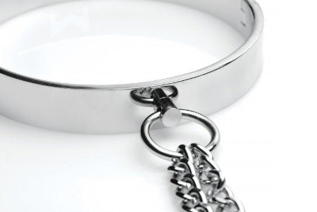 Chrome slave collar with a chain attachment.