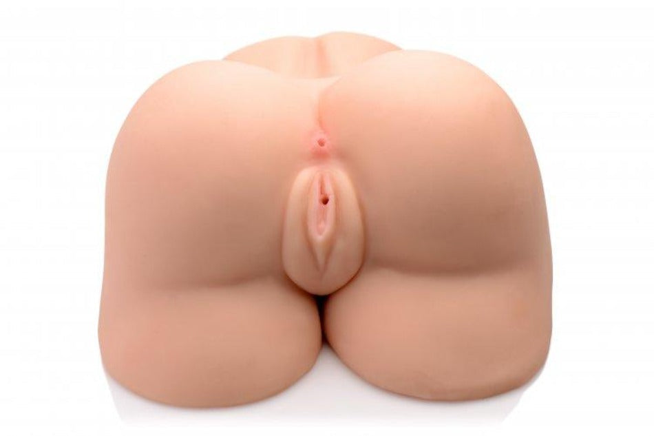 Rear view of Jesse Jane dual channel ass and pussy stroker in flesh-colored TPR.