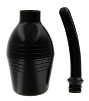 Black silicone enema bulb with a flexible tip.
