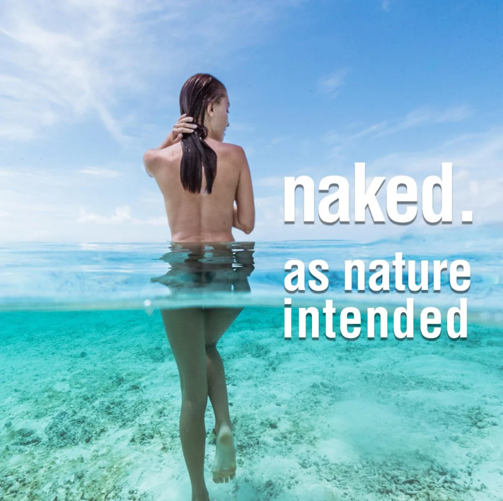 A woman stands in clear turquoise water with text overlayed.