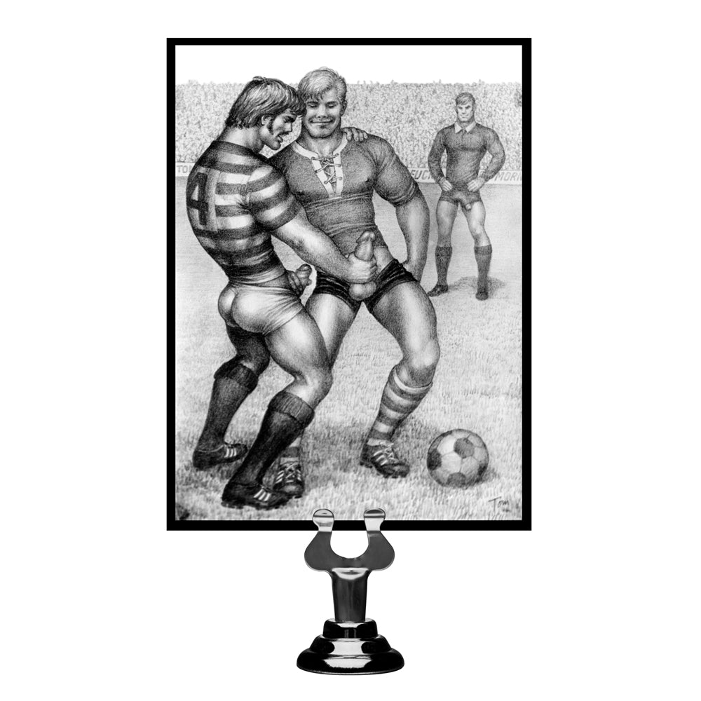 Black silicone anal ball cock ring with a Tom of Finland illustration.
