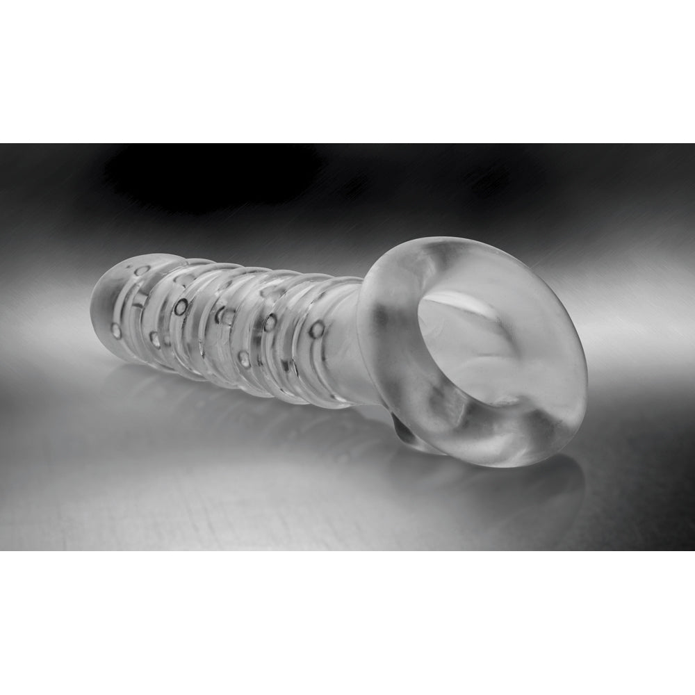 Clear textured girth enhancer sleeve with a ball strap.