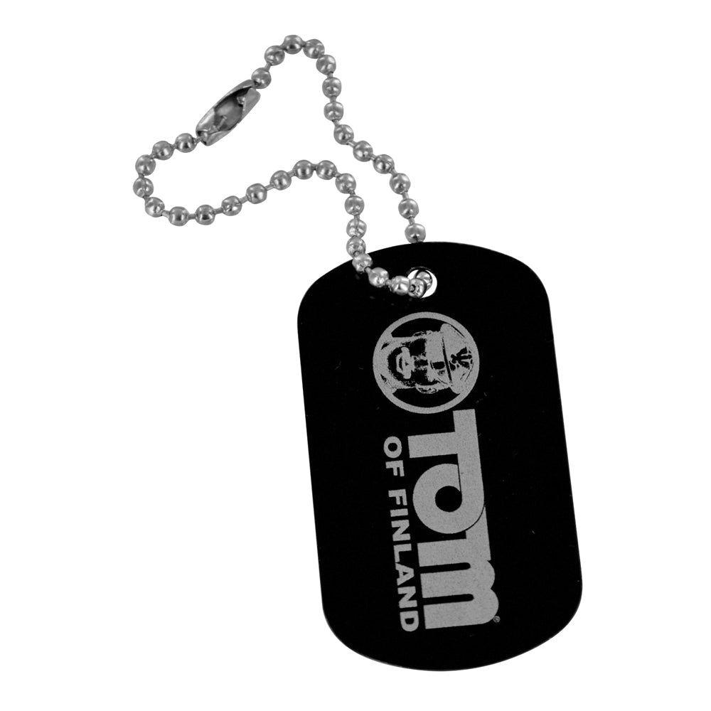 Black dog tag with Tom of Finland logo and ball chain.