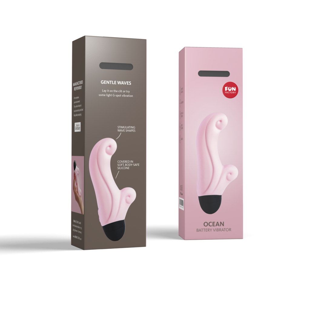 Pink curved vibrator with stimulating wave shapes on a box.
