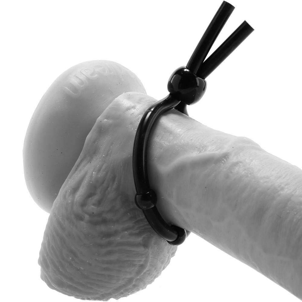 Adjustable black silicone cock ring with a lasso.