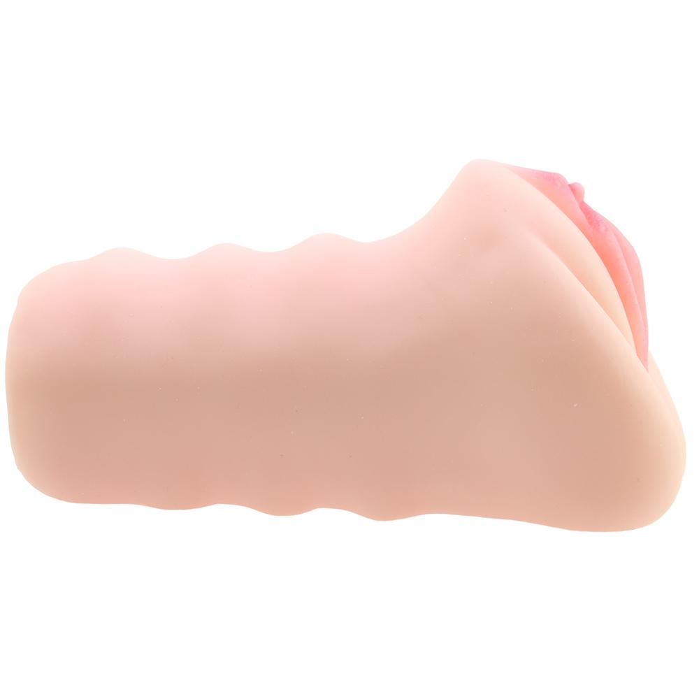 A pink realistic vagina stroker with textured interior.