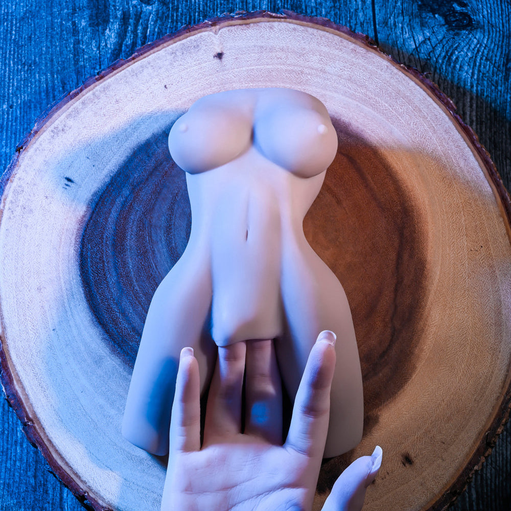 Realistic body stroker with textured channel and vibrating ring.