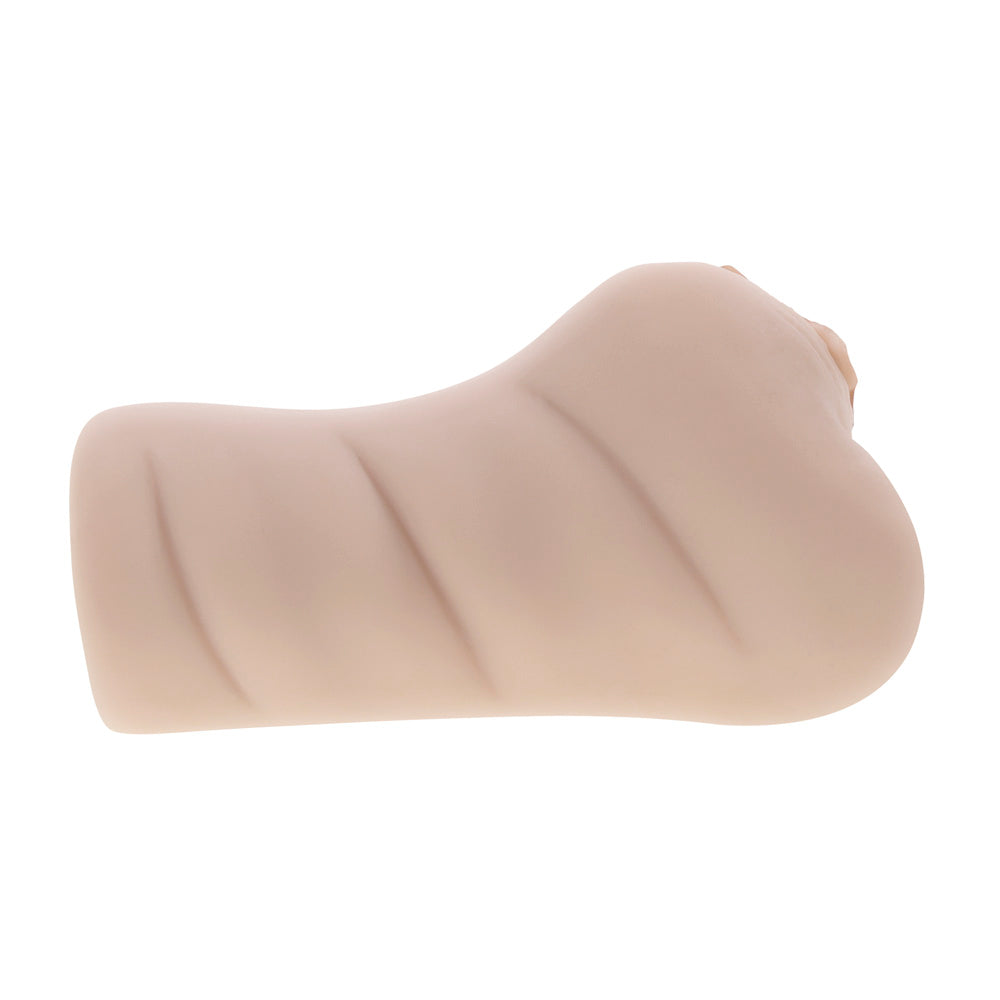 A flesh-toned dual entry stroker with textured ridges.